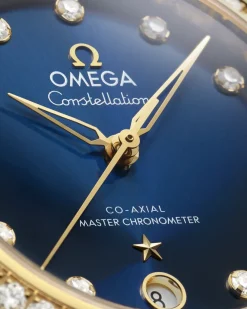 36 mm, acier ‑ or jaune sur bracelet en cuir|OMEGA Hot